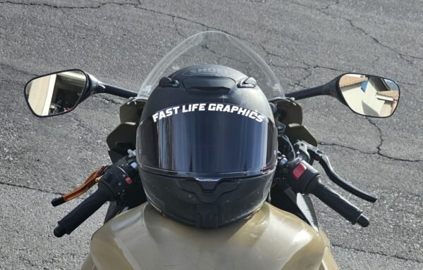 Black Helmet on Tan Bike With Fast Life Graphics Text Decal